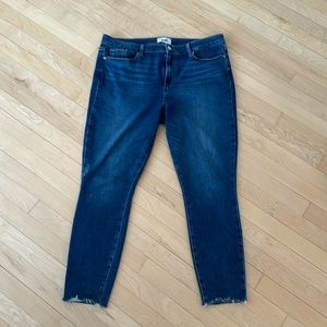 Paige jeans with raw hems and slight distressing